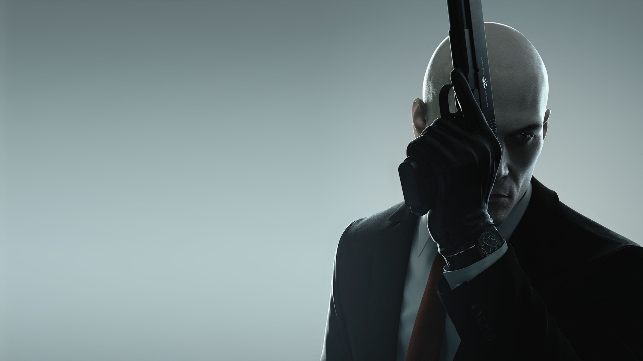 Preview wallpaper hitman, io interactive, square enix, agent, gun 2560x1440